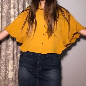 Yellow/orange bat winged shirt